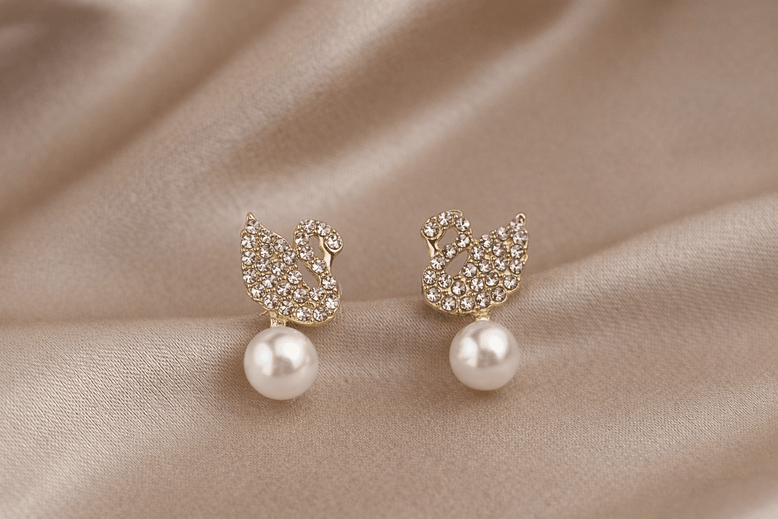 Gold Toned Swan Stud Pearl Earrings